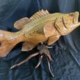 Highly Detailed Grouper or Bass Fish Wood Carving On Wood Driftwood
