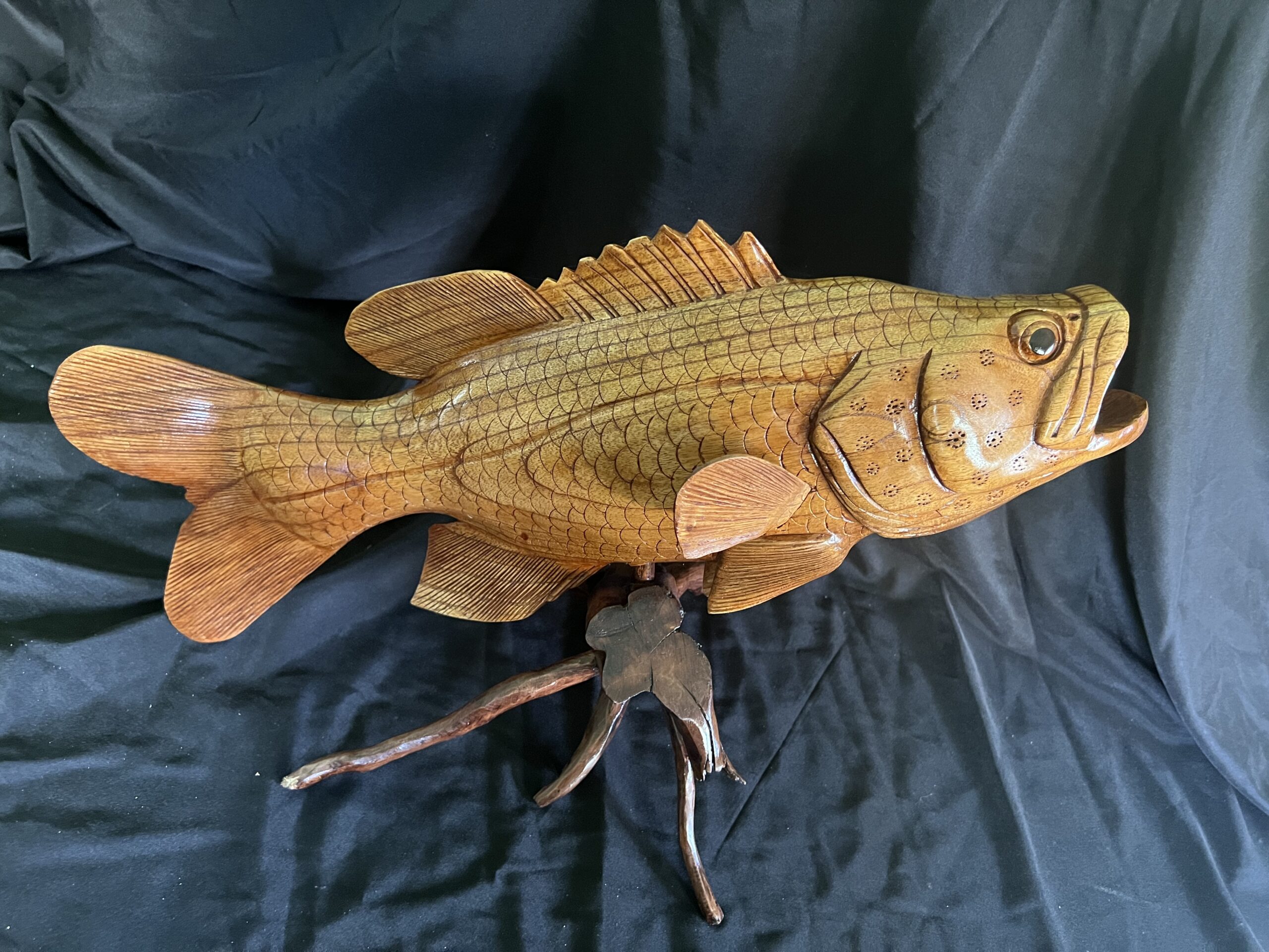 Highly Detailed Grouper or Bass Fish Wood Carving On Wood Driftwood